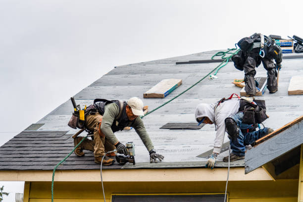 Professional Roofing technician working in Wells, ME